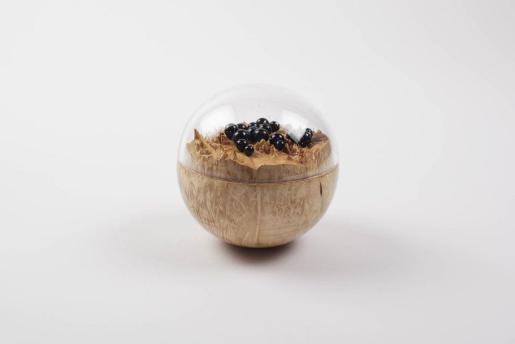 Un/Natural 8 Half wood, half glass orbs with glass lichen inside