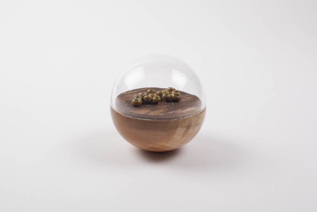 Un/Natural 5 Half wood, half glass orbs with glass lichen inside