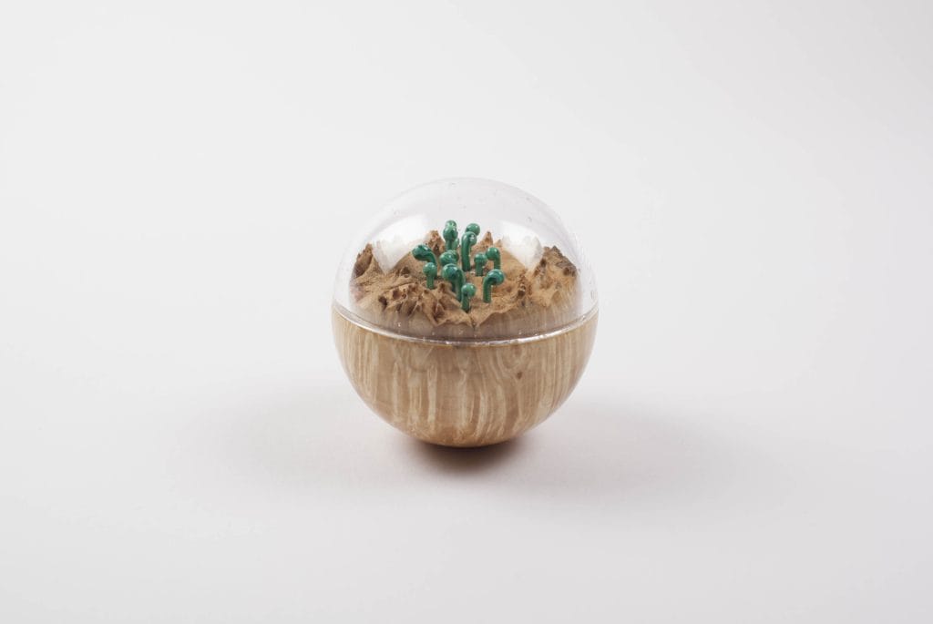 Un/Natural 3 Half wood, half glass orbs with glass lichen inside