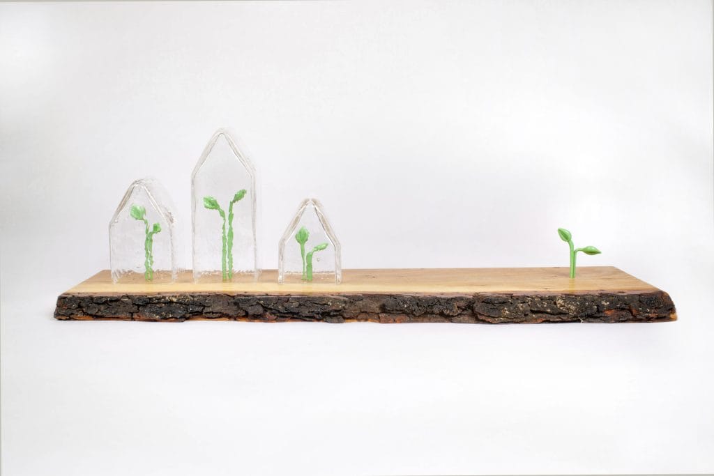 Un/Natural 15 Sculpture with glass houses and small glass sprouts inside