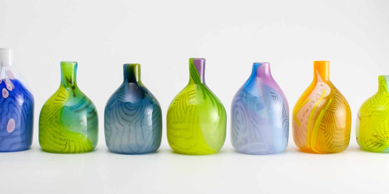 Brightly coloured and patterned bottles